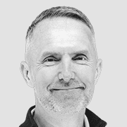 Ricky Butler headshot in black and white